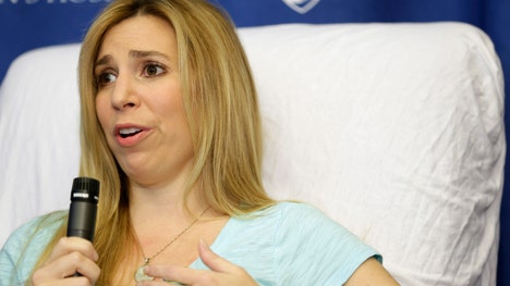 A week after a Boston Marathon bomb put Heather Abbott in a local hospital, the Rhode Island woman faced a difficult decision: try to keep her badly wounded foot, or have her leg amputated below the knee